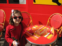 little girl dressed in red